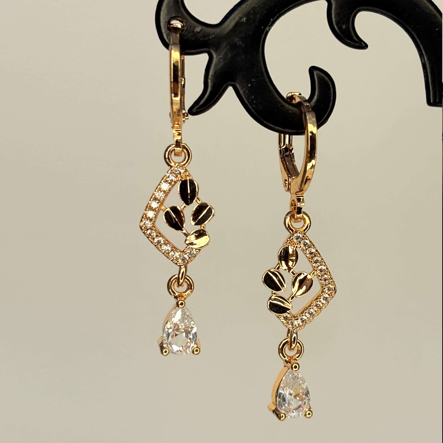 Golden AD Stone Drop Danglers