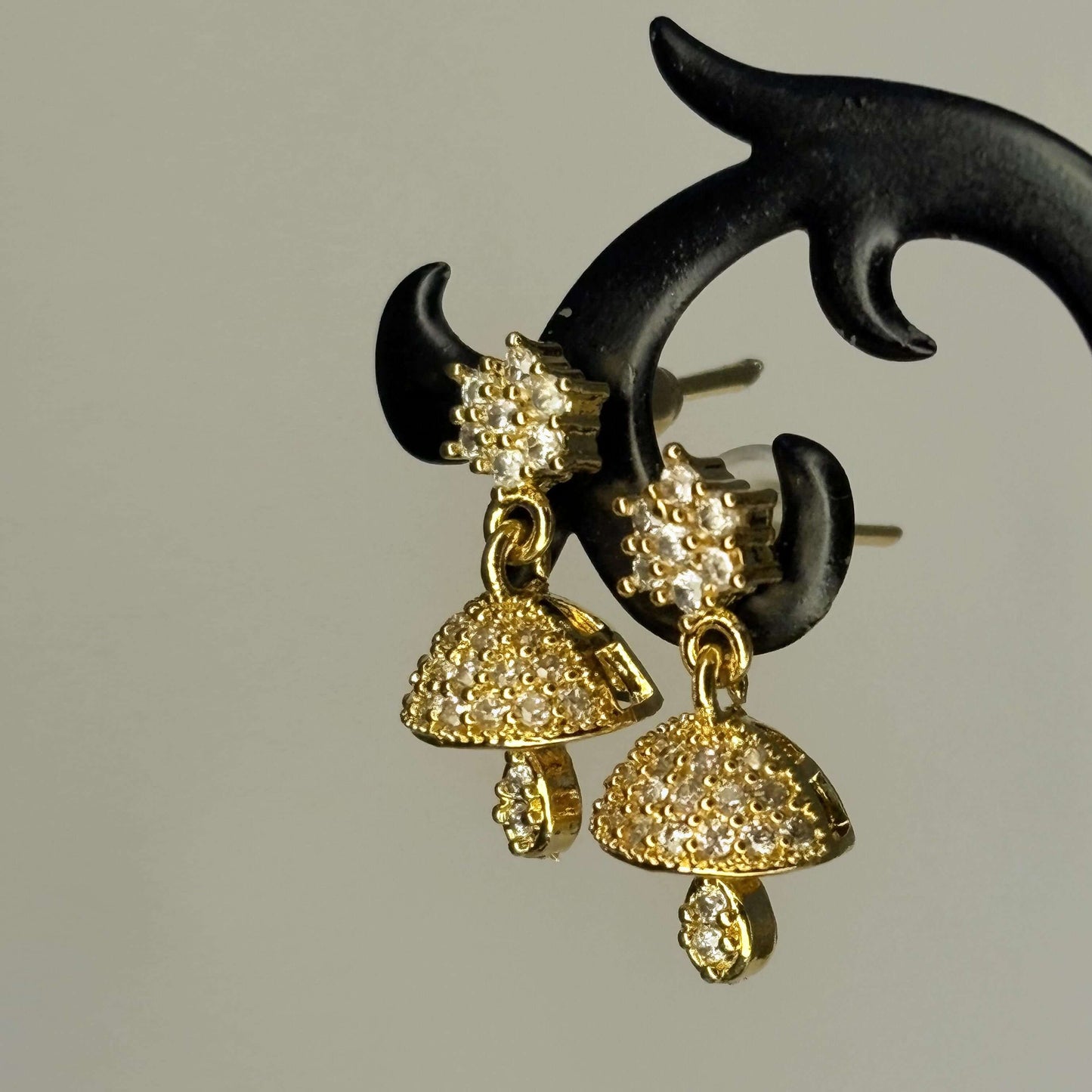 Golden AD Stone Star Jhumkas
