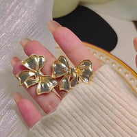Golden Anti Tarnish Bow Earrings